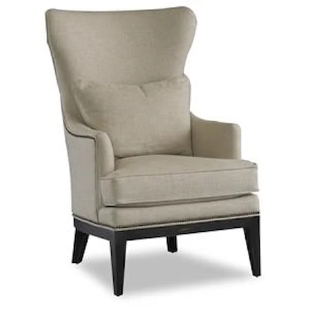 Transitional Wing Chair with English Arms and Exposed Wood Legs
